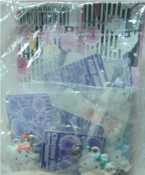 Yujin Sanrio Charmmy Hello Kitty Gashapon 8 Mascot Metal Strap Figure Set - Lavits Figure
- 2