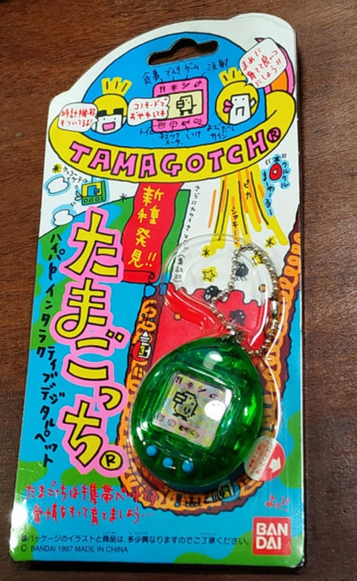 Bandai 1997 Tamagotchi LCD LSI Handheld Game Green Crystal ver