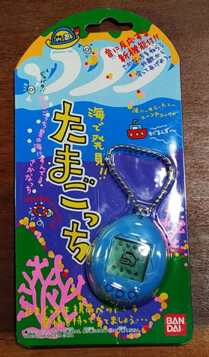 Bandai 1996 Tamagotchi LCD LSI Handheld Game Blue Ocean ver