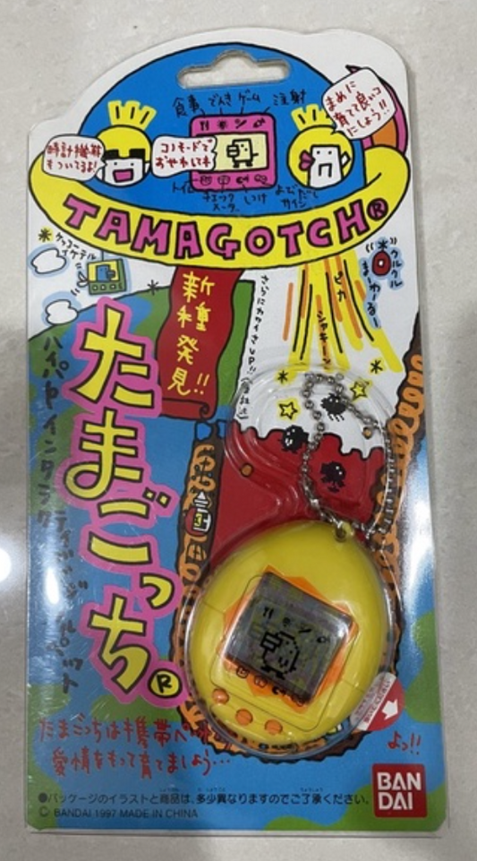 Bandai 1997 Tamagotchi LCD LSI Handheld Game Yellow ver