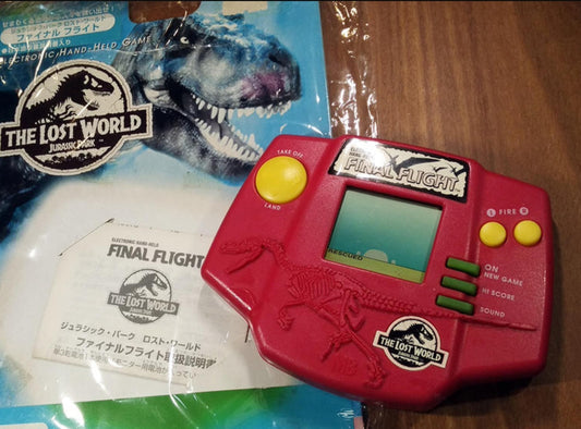 The Lost World Jurassic Park LSI Electronic Handheld Game
