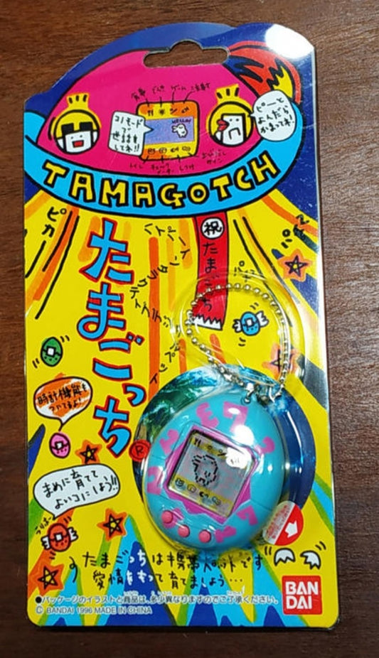 Bandai 1996 Tamagotchi LCD LSI Handheld Game Peach Blue ver