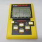 Grandstand 1983 Pocket Pac Man Handheld Video LCD Game - Lavits Figure
 - 1